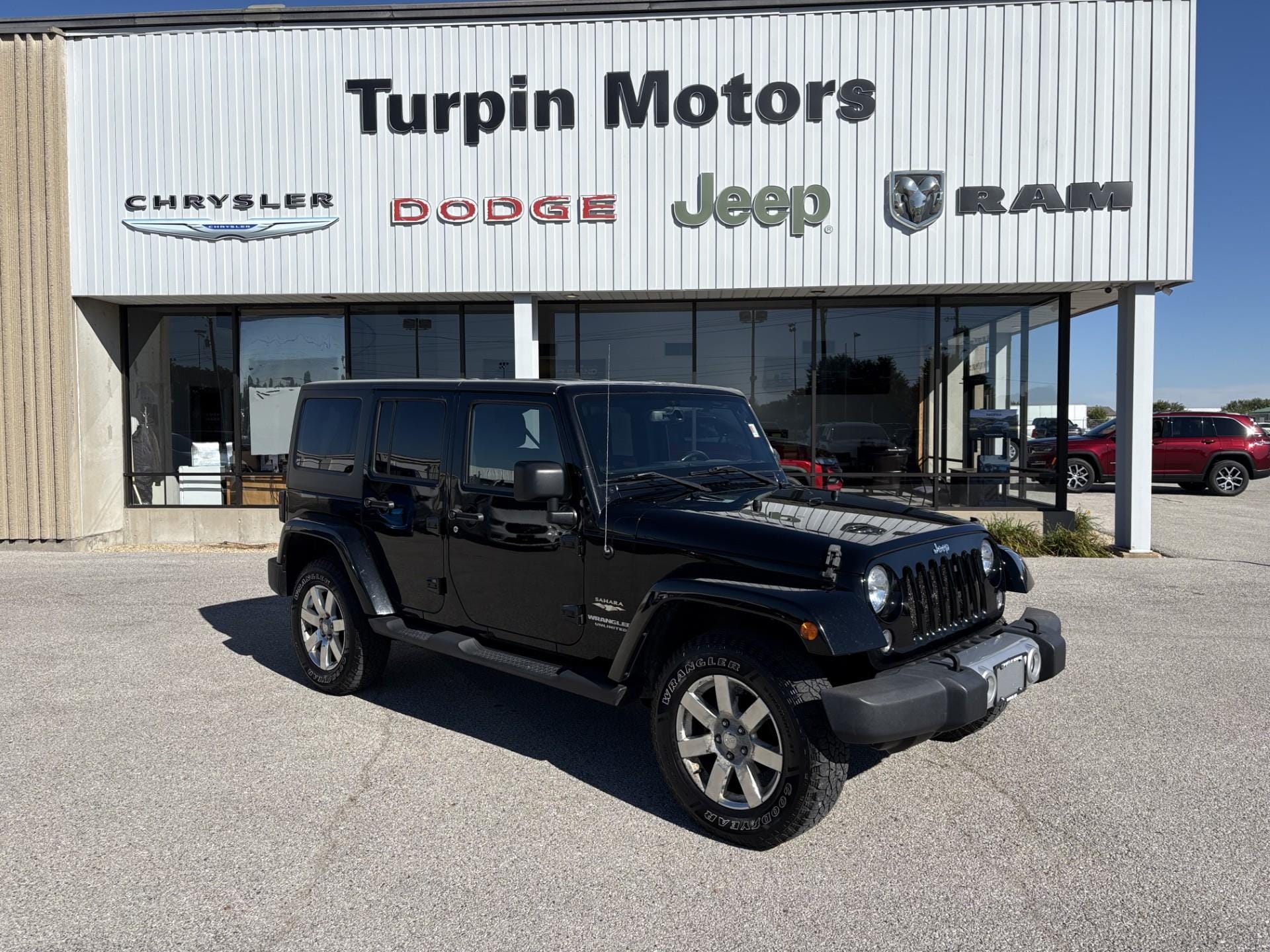 Used 2015 Jeep Wrangler Unlimited Sahara with VIN 1C4BJWEG2FL520061 for sale in Geneseo, IL